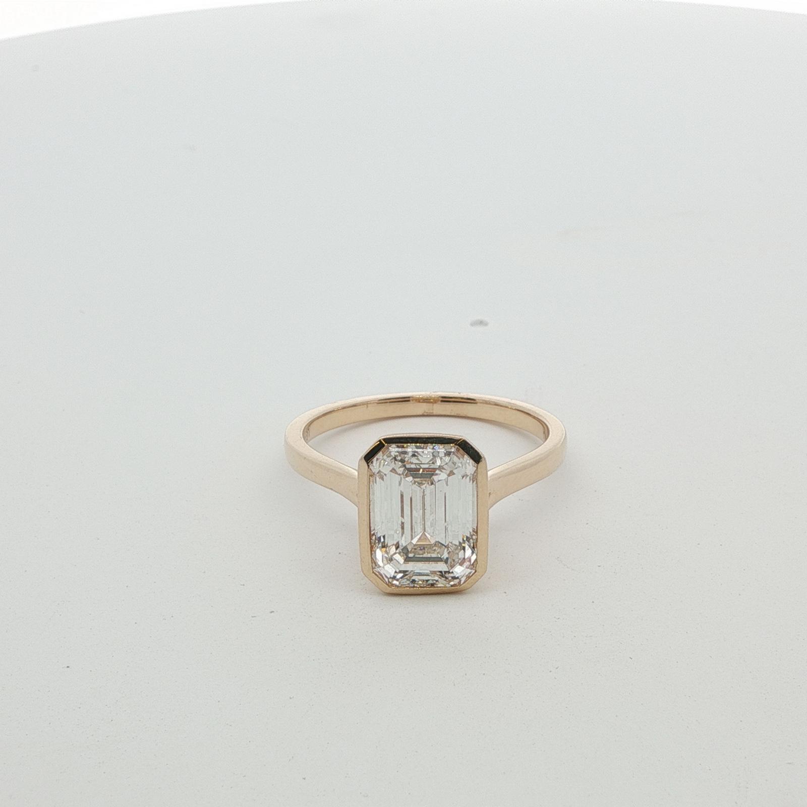 Bezel set in 14k yellow gold