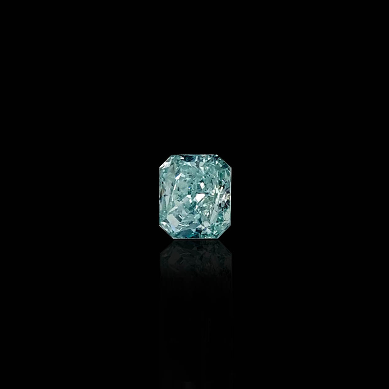 0.55 Carat Radiant Fancy Intense Blue Green Diamond Judith Arnell Jewelers