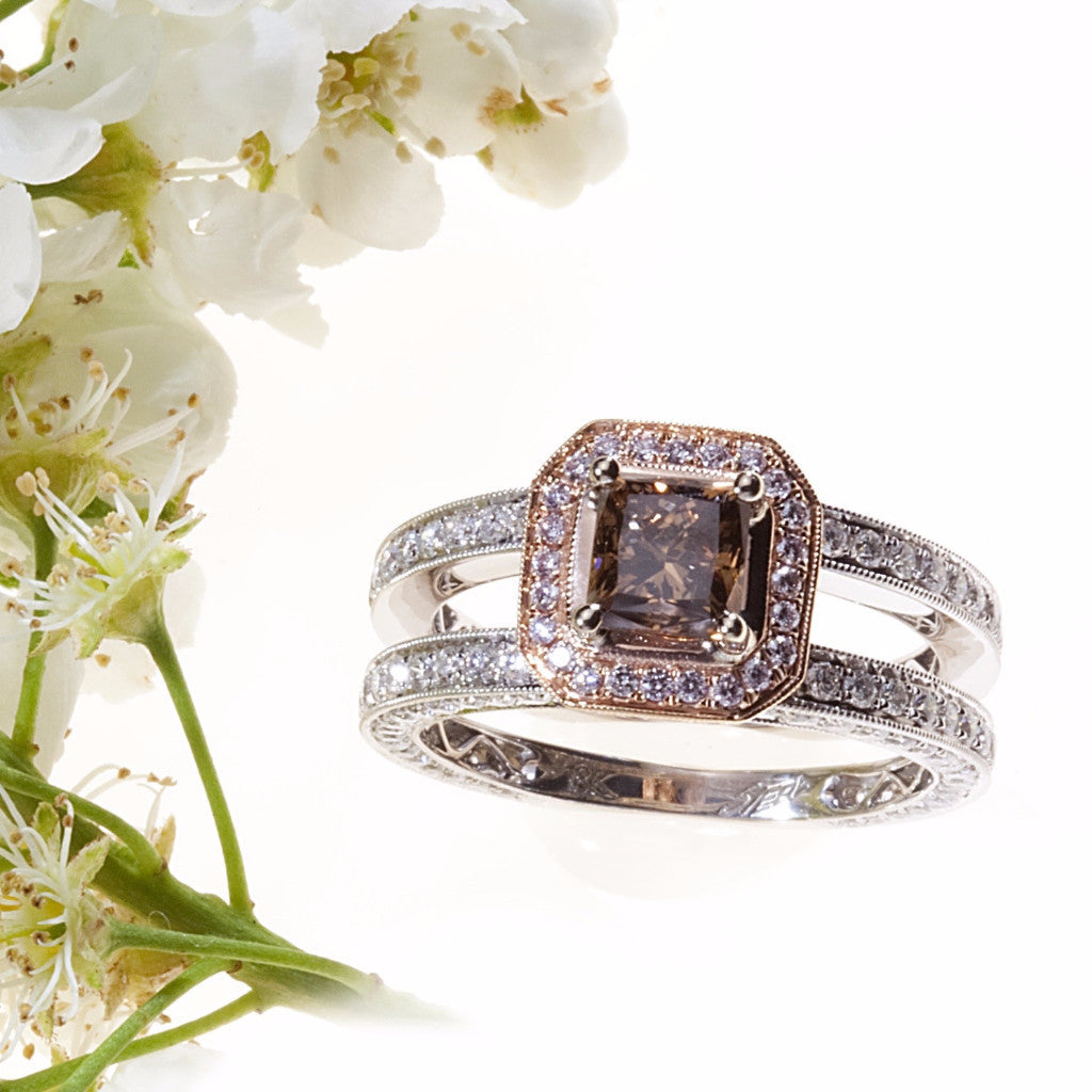 white and rose gold double shank engagement ring with cognac, pink, and white diamonds