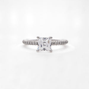 18K white gold diamond engagement ring with pave-set round brilliant diamonds weighing a total of 0.85 carats. 