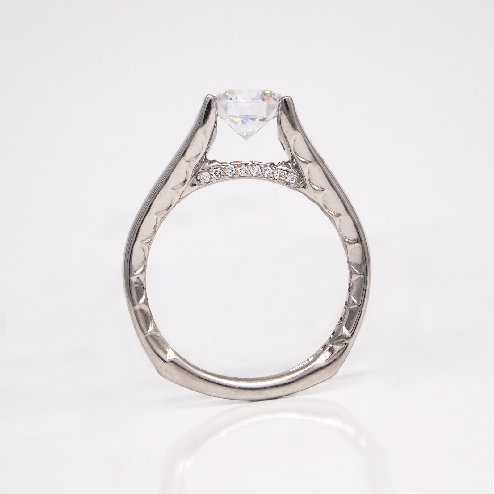 White palladium diamond engagement ring with diamonds weighing a total of 0.50 carats. Made to order to fit any size diamond or gemstone center stone. 