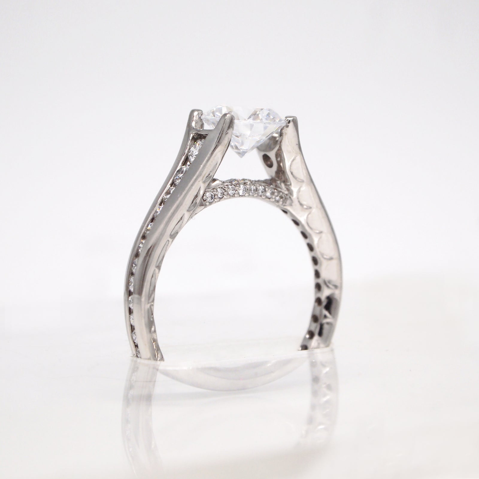 White palladium diamond engagement ring with diamonds weighing a total of 0.50 carats. Made to order to fit any size diamond or gemstone center stone. 