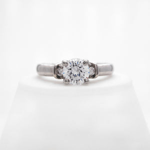 Palladium diamond engagement ring featuring round brilliant diamonds weighing a total of 0.36 carats. 