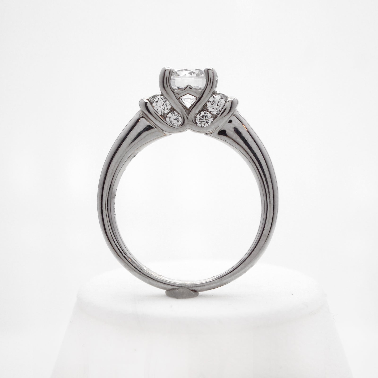 Palladium diamond engagement ring featuring round brilliant diamonds weighing a total of 0.36 carats. 