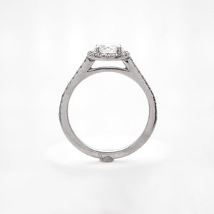Platinum diamond engagement ring with round brilliant diamonds weighing a total of 0.28 carats. 