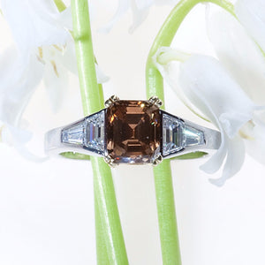 contemporary platinum and yellow gold cognac and white diamond engagement ring