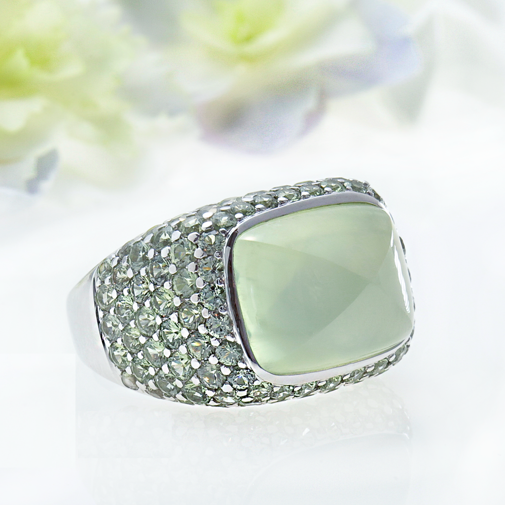 Angled view of white gold prehnite and pave set mint green sapphire ring