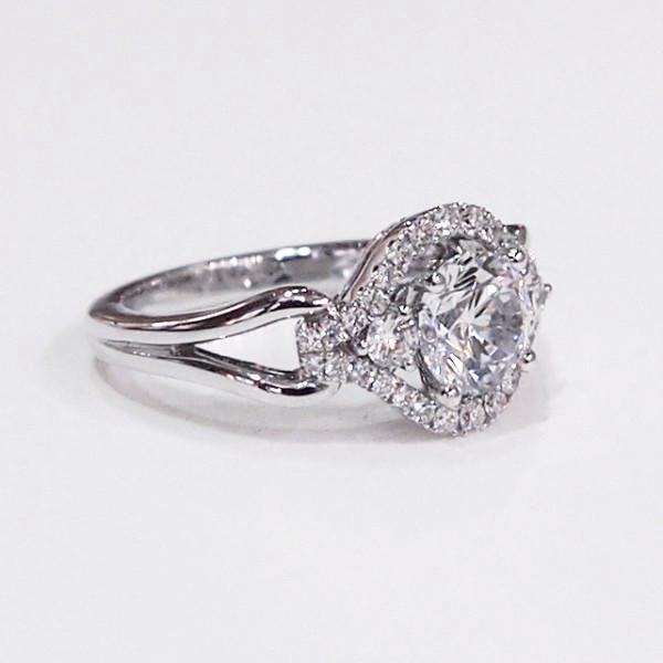 14K white gold semi-mount engagement ring with a halo containing 32 diamonds