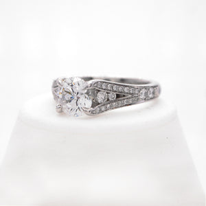 Platinum diamond engagement ring with round brilliant diamonds weighing a total of 0.49 carats.