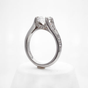 Platinum diamond engagement ring with round brilliant diamonds weighing a total of 0.49 carats.