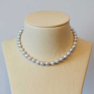 Pearl strand necklace featuring silvery-blue baroque pearls (8mm - 9mm) and a 14K rose gold clasp. 