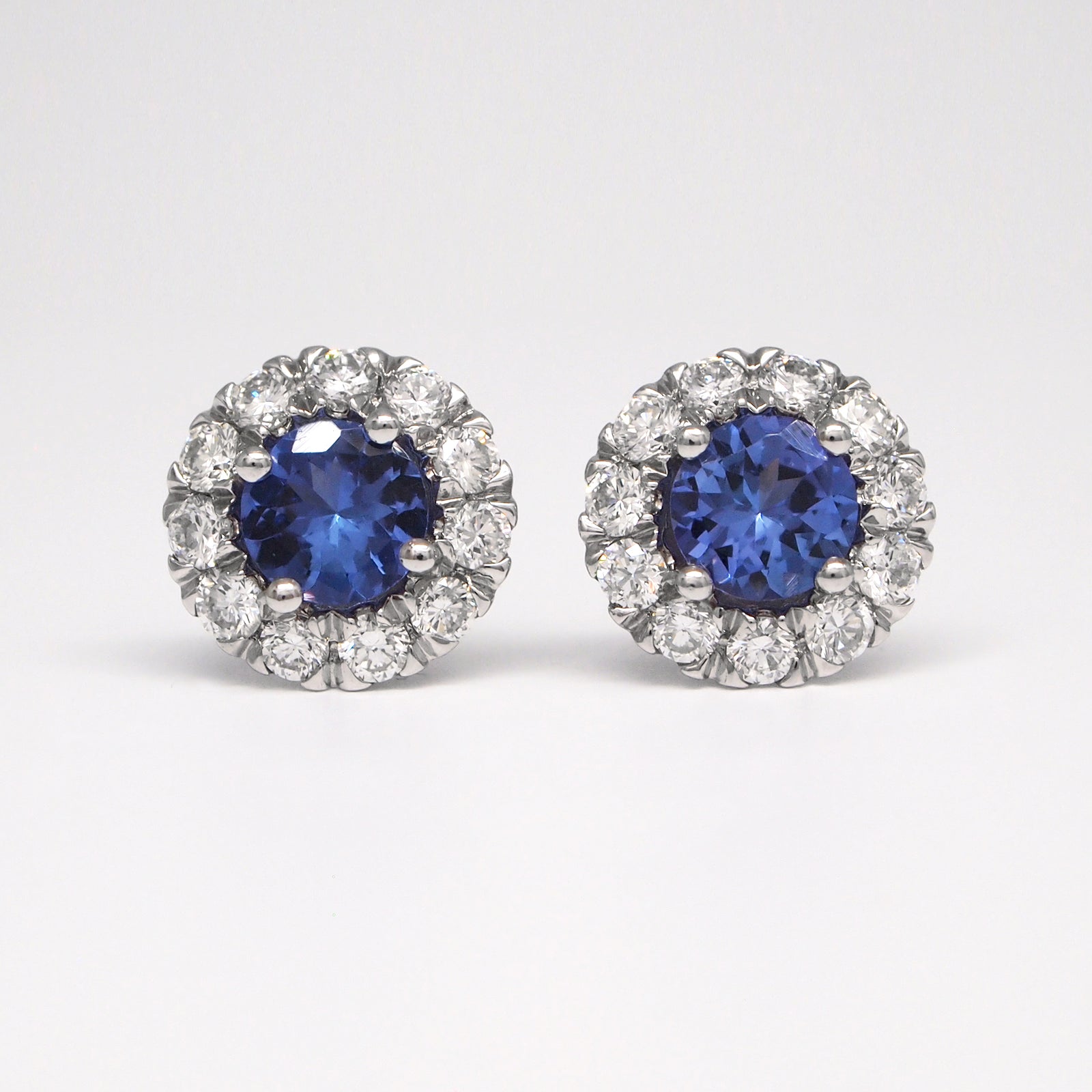14K White Gold Tanzanite Earrings With Diamond Halo