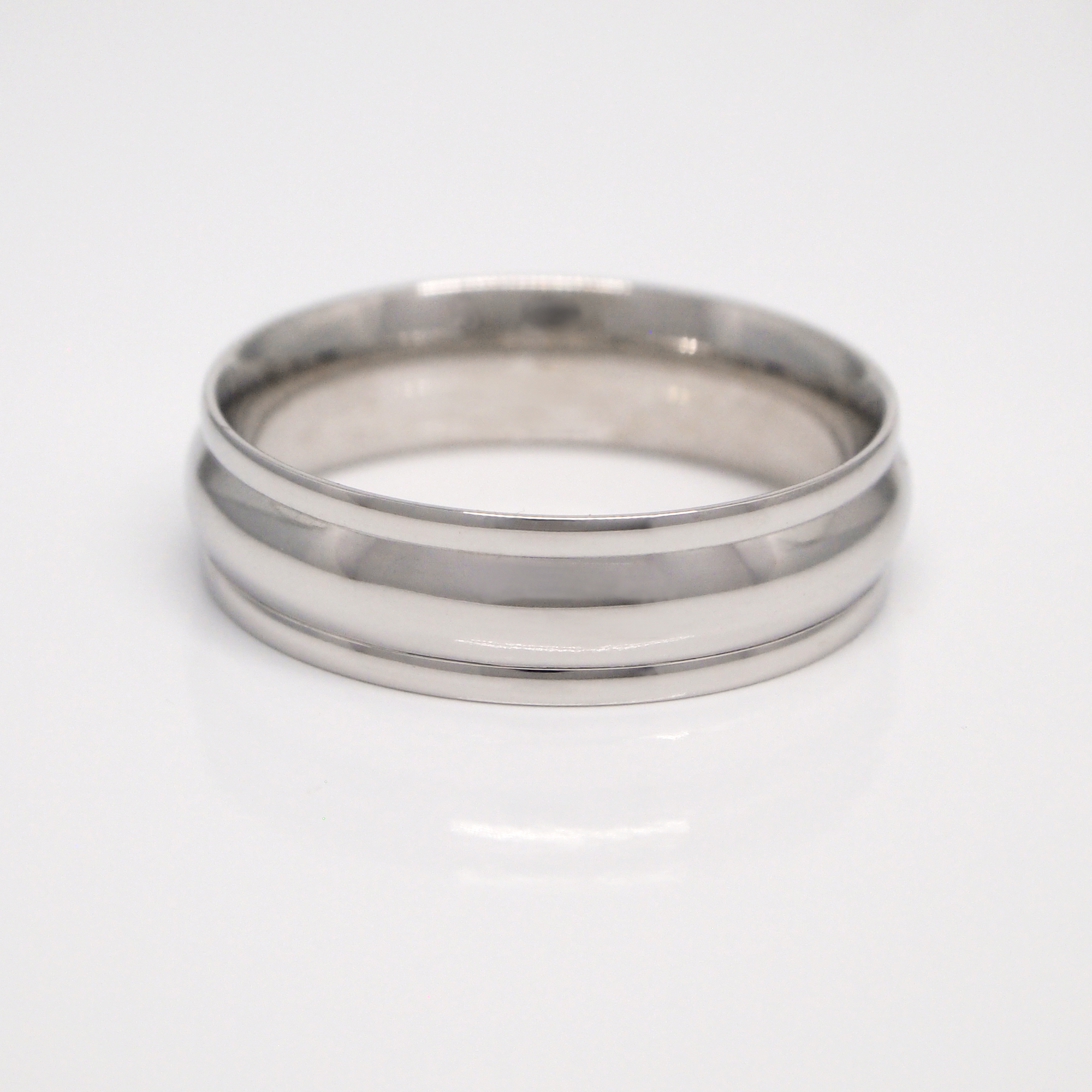 14K white gold 6mm men's wedding band featuring 3 sections and a high polish finish.
