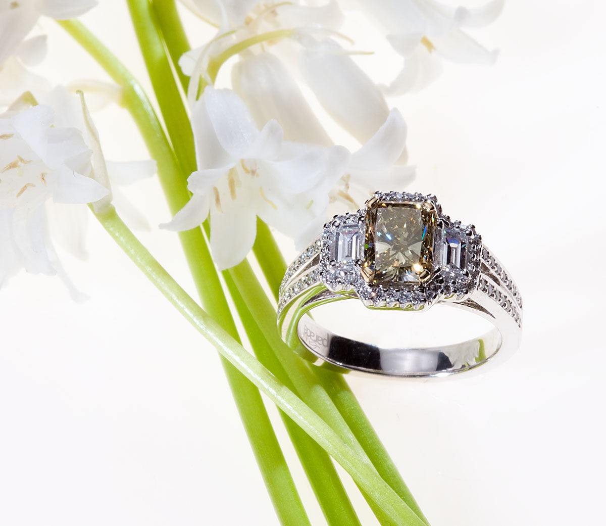 White Gold Radiant Cut Yellow-Green Three Stone Diamond Engagement Ring with White Diamonds