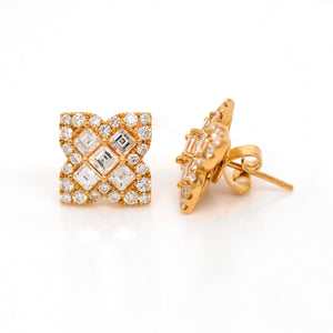 18K yellow gold diamond earrings featuring Asscher and round diamonds weighing a total of 2.78 carats set in a 4-point clover design.