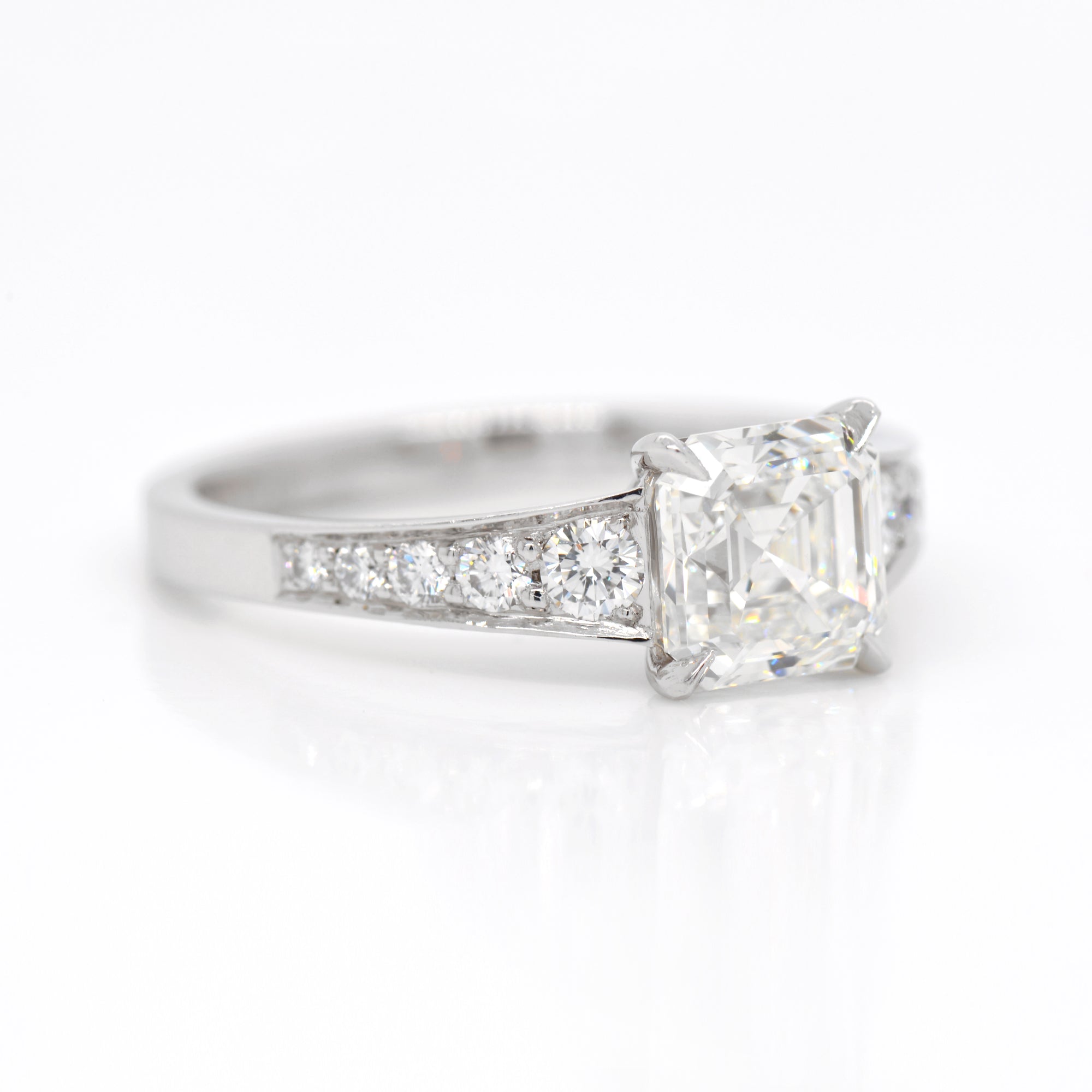 Platinum Asscher Diamond Graduated Engagement Ring