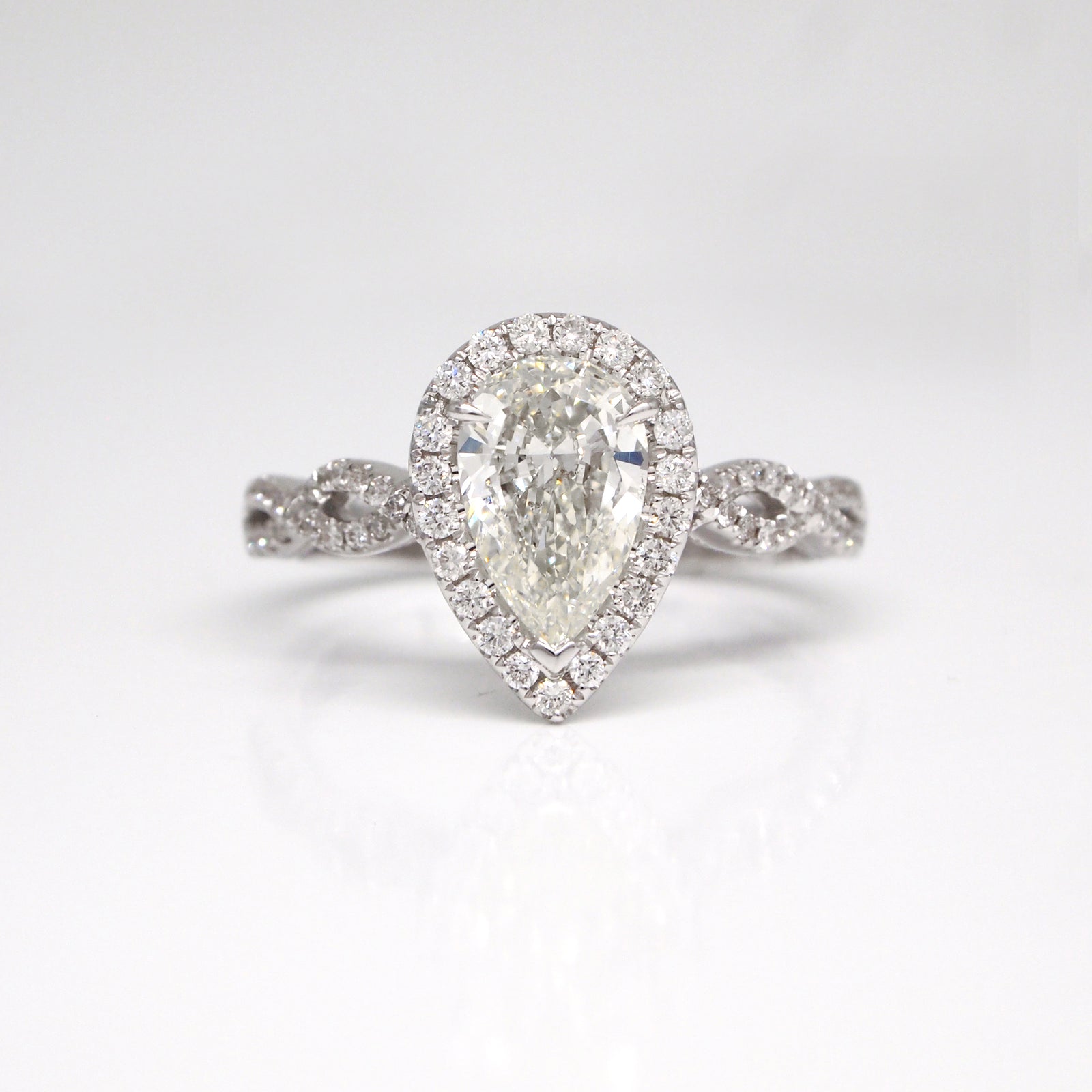 14K Pear-Shaped Diamond Twist Engagement Ring With Halo