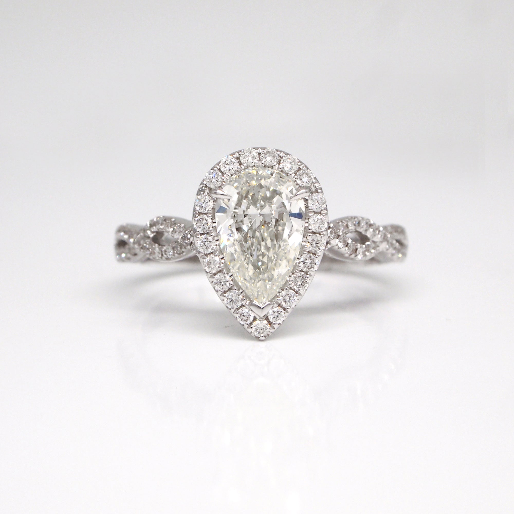 14K Pear-Shaped Diamond Twist Engagement Ring With Halo