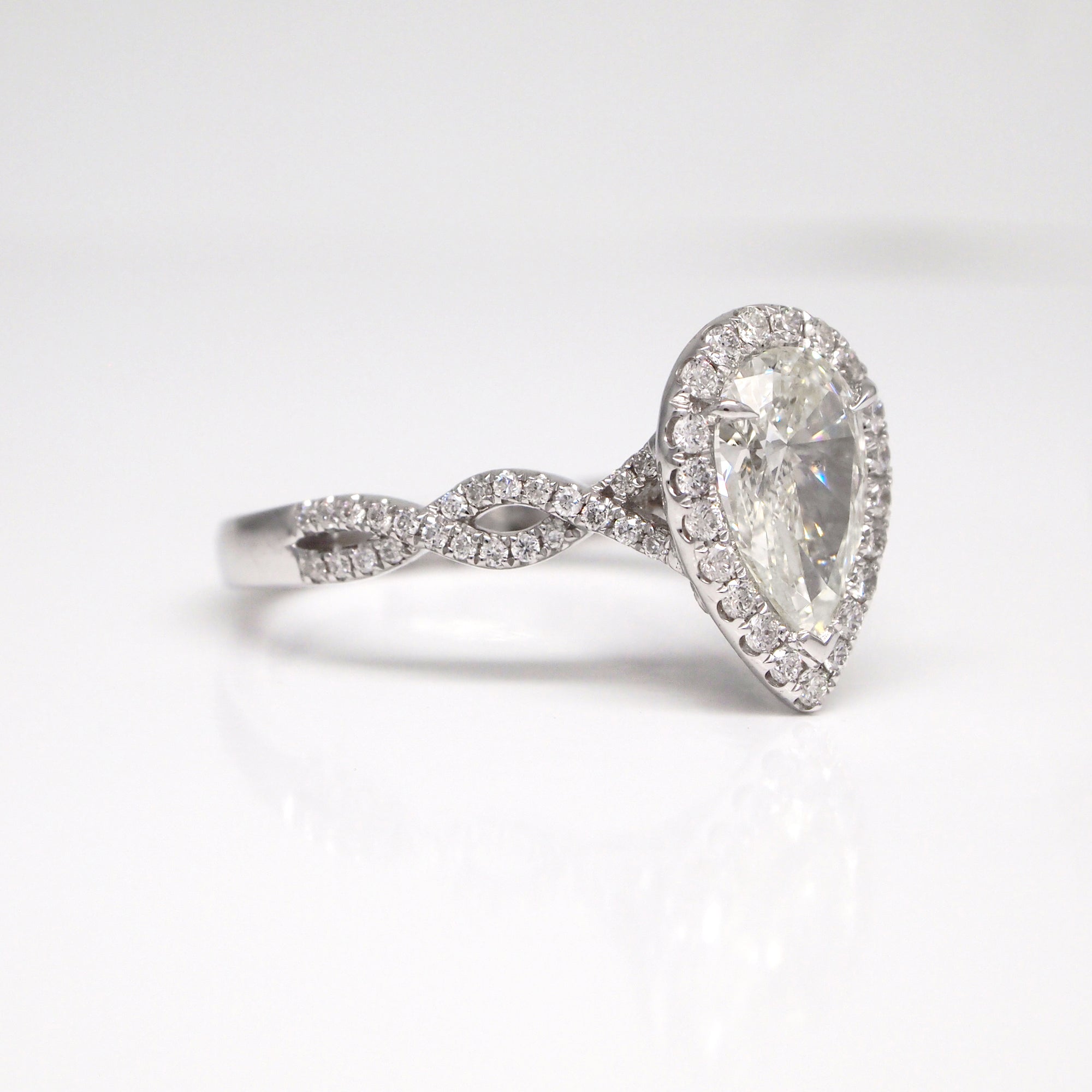 14K Pear-Shaped Diamond Twist Engagement Ring With Halo