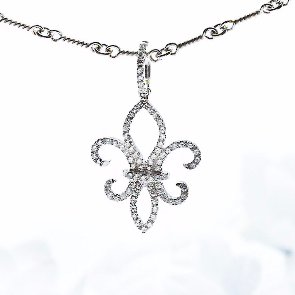 18K white gold "Fleur De Lis" pendant with 84 round diamonds