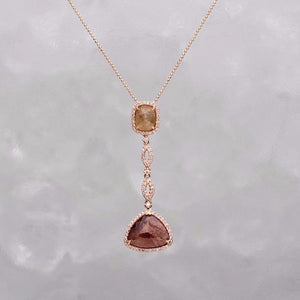18K yellow gold rough-cut opaque diamond pendant with green, brown/red, and white diamonds