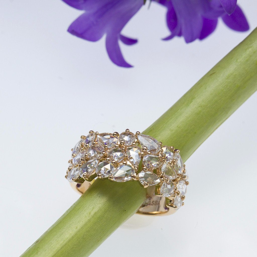Front facing view of 18K rose gold diamond ring with 23 rose-cut diamonds
