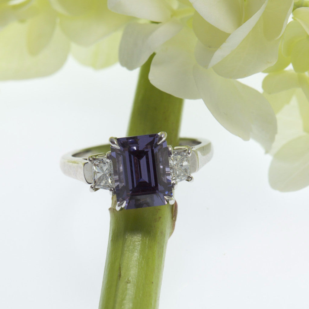 platinum ring featuring a color change blue lavender spinel and diamonds