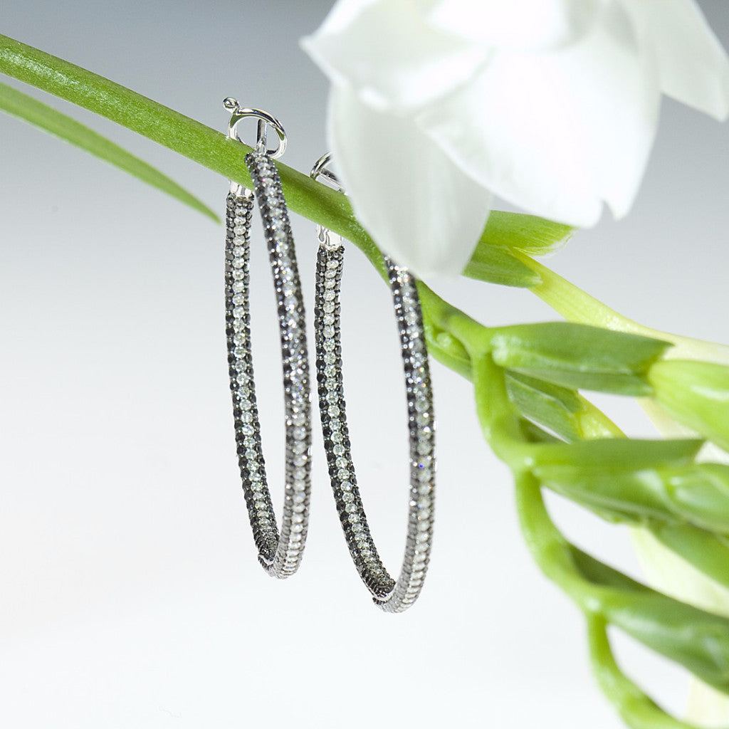 White gold earring hoops with white and black diamonds