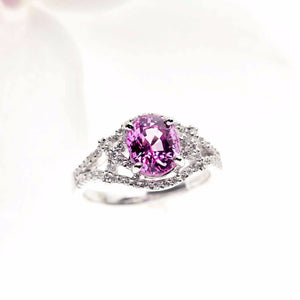 Platinum Oval Pink Sapphire Ring With Pave Set Diamonds