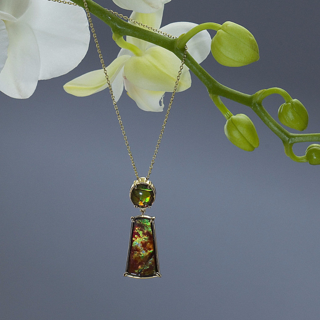 One Of A Kind Ammolite Fossil Pendant on a yellow gold cable link chain