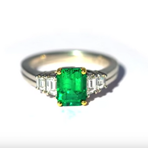 Front facing view of Platinum and Yellow Gold Emerald and Diamond Ring