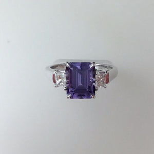 platinum ring featuring a color change blue lavender spinel and diamonds