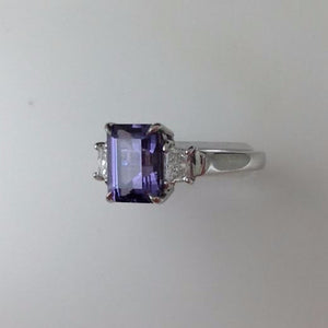 platinum ring featuring a color change blue lavender spinel and diamonds