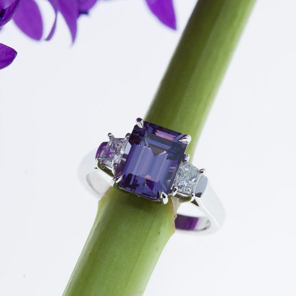 platinum ring featuring a color change blue lavender spinel and diamonds