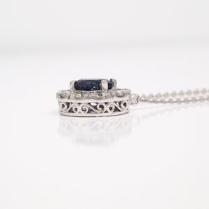 Filigree detail on custom designed sapphire and diamond necklace