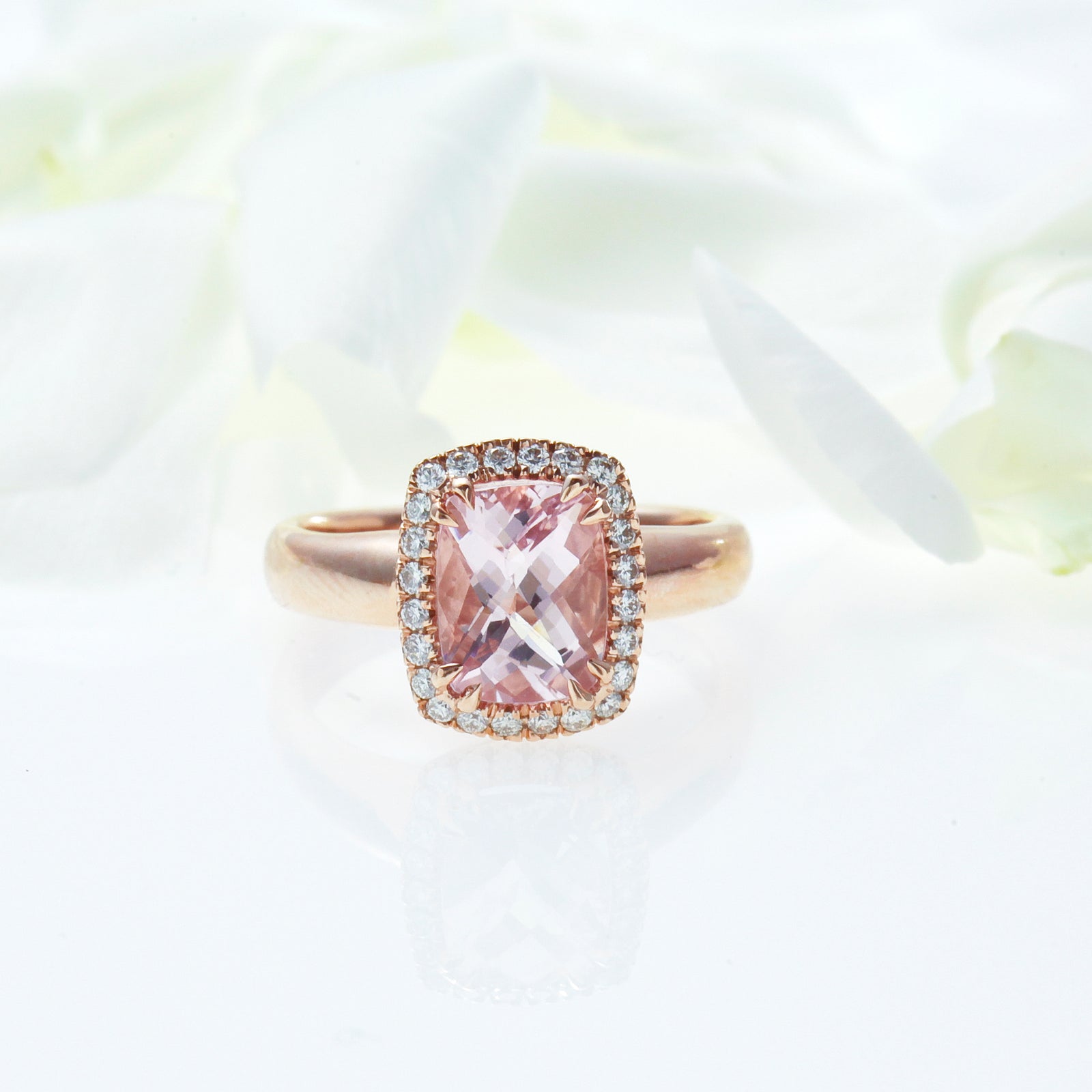 14K pink gold ring with one cushion-cut morganite and diamonds